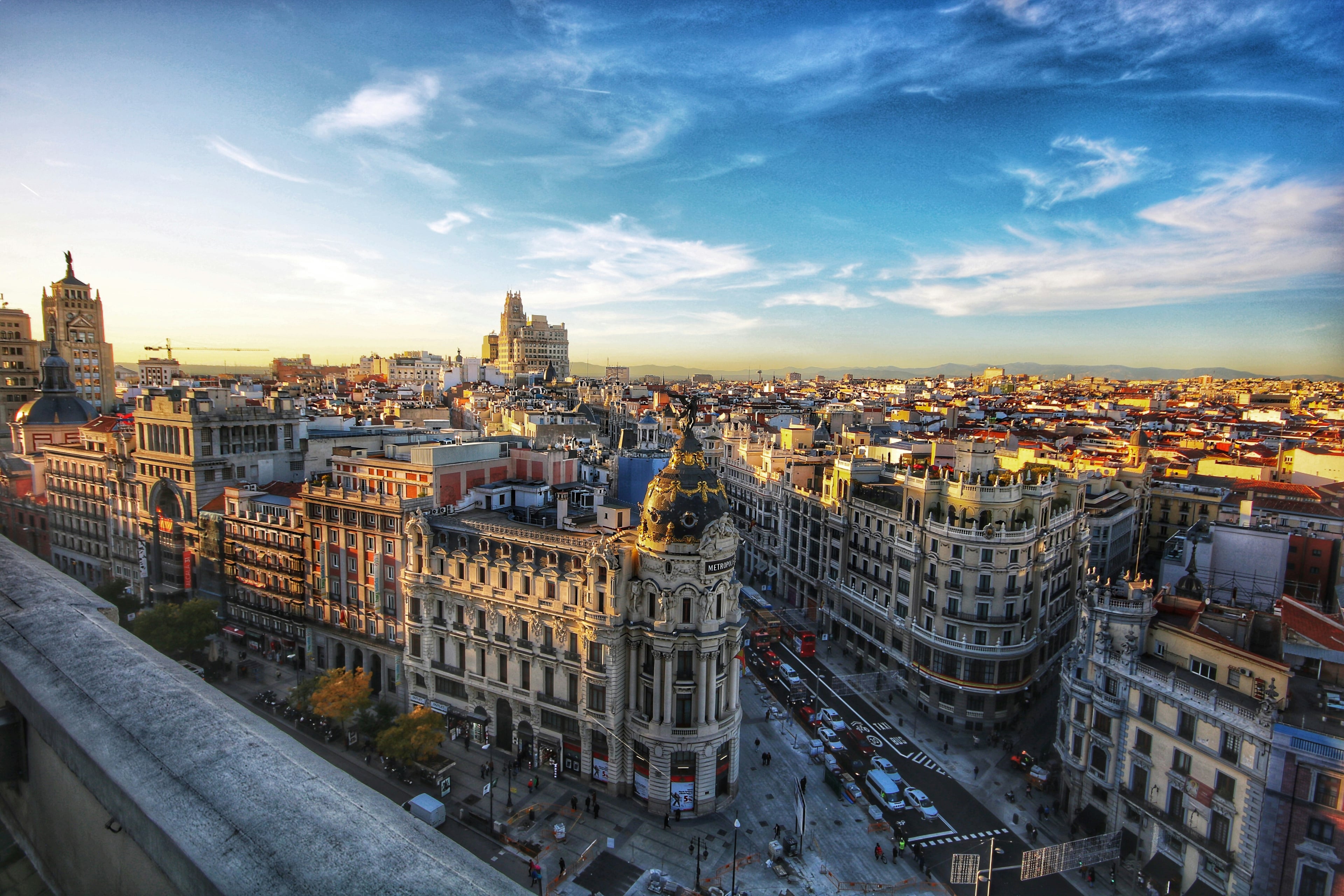 Madrid cityscape at golden hour with the Metropolis Building